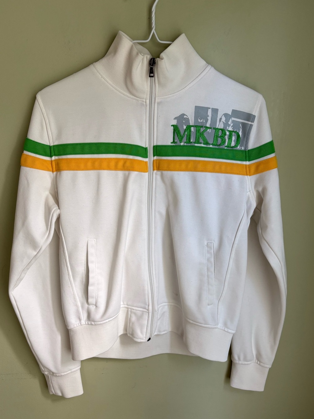 Makaveli Branded white  zip track jacket. Size M. Green/yellow stripes w/logo.